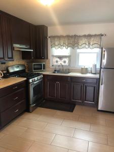 A kitchen or kitchenette at Boardwalk Beach Inn