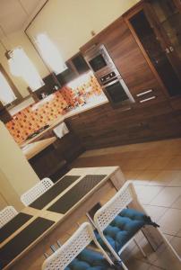 Kuchyňa alebo kuchynka v ubytovaní W&M Stylish Apartment