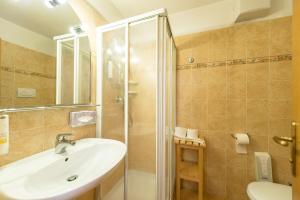 Koupelna v ubytování Alpstyle Hotel Albolina Wellness & Beauty