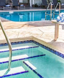 a swimming pool with lanes in the water at Southernmost Inn Adult Exclusive in Key West