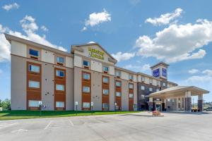 a rendering of a hotel with a parking lot at MainStay Suites Lincoln University Area in Lincoln