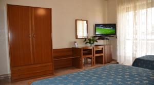 A bed or beds in a room at Hotel A-14