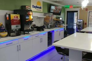 A kitchen or kitchenette at Days Inn by Wyndham Houston East