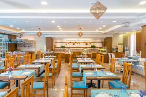 A restaurant or other place to eat at Mediterranean Resort