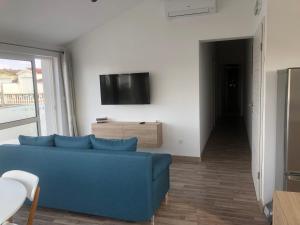 TV a/nebo společenská místnost v ubytování Ideal Holiday Apartment 2