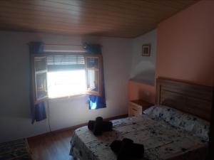 Postel nebo postele na pokoji v ubytování Apartament turístic Cal Mases , Camarasa
