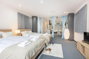 Postel nebo postele na pokoji v ubytování Uhome Ueno Apartment 4