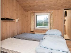 Postel nebo postele na pokoji v ubytování Luxury Retreat in Als - By Traum Ferienwohnungen