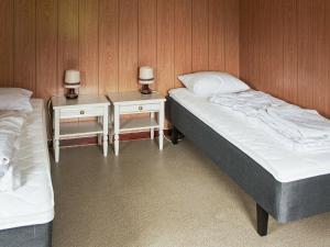 Voodi või voodid majutusasutuse Holiday Home Vågland toas
