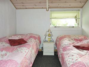 Postel nebo postele na pokoji v ubytování Holiday Home Lappedykkervej