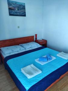 Posteľ alebo postele v izbe v ubytovaní Apartments Jerkovic