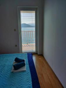 Posteľ alebo postele v izbe v ubytovaní Apartments Jerkovic