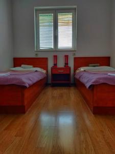 Posteľ alebo postele v izbe v ubytovaní Apartments Jerkovic