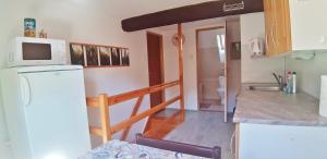 Kuchyň nebo kuchyňský kout v ubytování Chalupa U Studánky