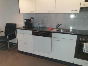 Kuhinja oz. manjša kuhinja v nastanitvi 3 Doppel Zimmer Apartement in 9320 Arbon