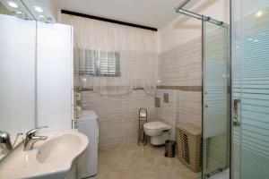Kúpeľňa v ubytovaní Apartmani Šime