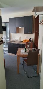 Kuchyň nebo kuchyňský kout v ubytování ELG Rooms + 37 fotografií