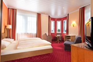 TV a/nebo společenská místnost v ubytování Hotel Goldenes Fass in Rothenburg ob der Tauber