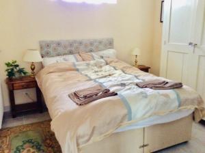 מיטה או מיטות בחדר ב-Gite de Pete