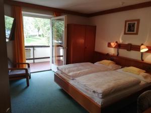 Кровать или кровати в номере Hotel Rodes