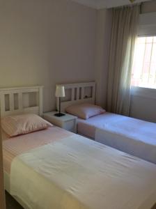 Postel nebo postele na pokoji v ubytování Agua Marina exklusiv apartment + 21 fotografií