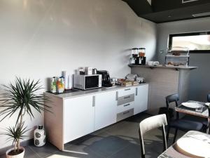 A kitchen or kitchenette at Sicilia Bedda B&B