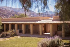 a building with a view of the mountains at Patio Alto in Tilcara