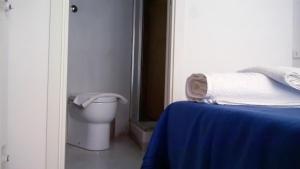 Postel nebo postele na pokoji v ubytování 2 Be Home Colosseo