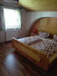 Posteľ alebo postele v izbe v ubytovaní Ferienhaus Ruggenthaler