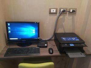 TV a/nebo společenská místnost v ubytování Hotel Toscana