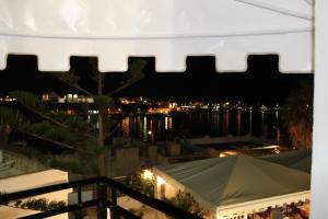 a view from the balcony at night at Hotel Medusa in Lampedusa