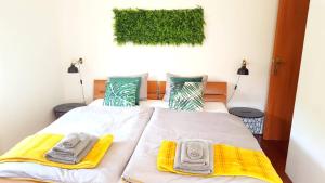 Posteľ alebo postele v izbe v ubytovaní Apartment Greenhouse