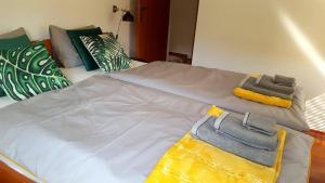 Posteľ alebo postele v izbe v ubytovaní Apartment Greenhouse