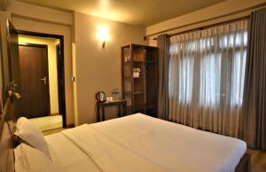 Letto o letti in una camera di Sabila Boutique Hotel