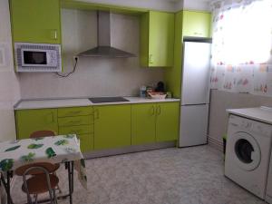 Kuchyň nebo kuchyňský kout v ubytování Vivienda de Uso Turistico Ramos 3 + 11 fotografií