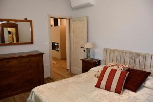 Letto o letti in una camera di Podere Codone