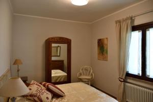 Letto o letti in una camera di Podere Codone