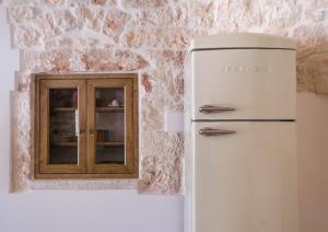 A kitchen or kitchenette at iTrulliescape