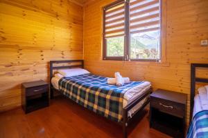 Postel nebo postele na pokoji v ubytování Badishi Guesthouse