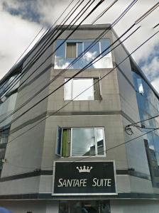 a building with a sign for a santee suite at Hotel Santafe Suite in Bogotá