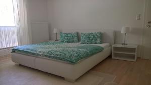 Postel nebo postele na pokoji v ubytování Appartement Erlbacher