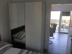 Posteľ alebo postele v izbe v ubytovaní Apartmani Eden Vrsi Mulo