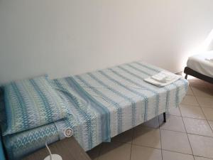 Cama o camas de una habitación en Residence Bano