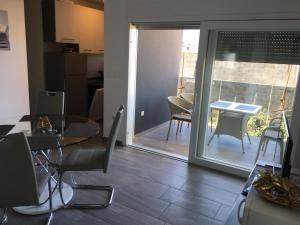 Posedenie v ubytovaní Apartmani Eden Vrsi Mulo