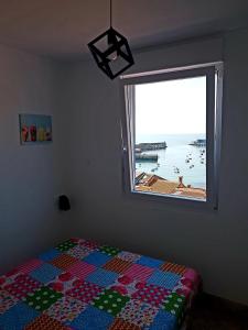 Vuode tai vuoteita majoituspaikassa Casa con vistas al mar en A Guarda