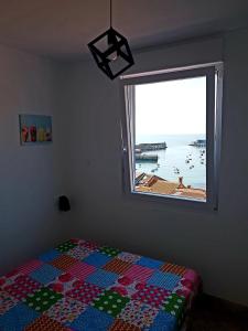 Posteľ alebo postele v izbe v ubytovaní Casa con vistas al mar en A Guarda
