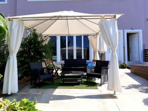 A patio or other outdoor area at Luxury Suites in Stavromenos