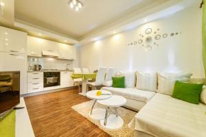 Η κουζίνα ή μικρή κουζίνα στο Apartments Arbis