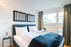 Posteľ alebo postele v izbe v ubytovaní Vienna Residence, Hietzing - Schönbrunn
