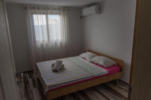 Ένα ή περισσότερα κρεβάτια σε δωμάτιο στο Leonida Resort